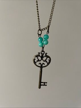 Light Green Turquoise Round gemstone + key Necklace.